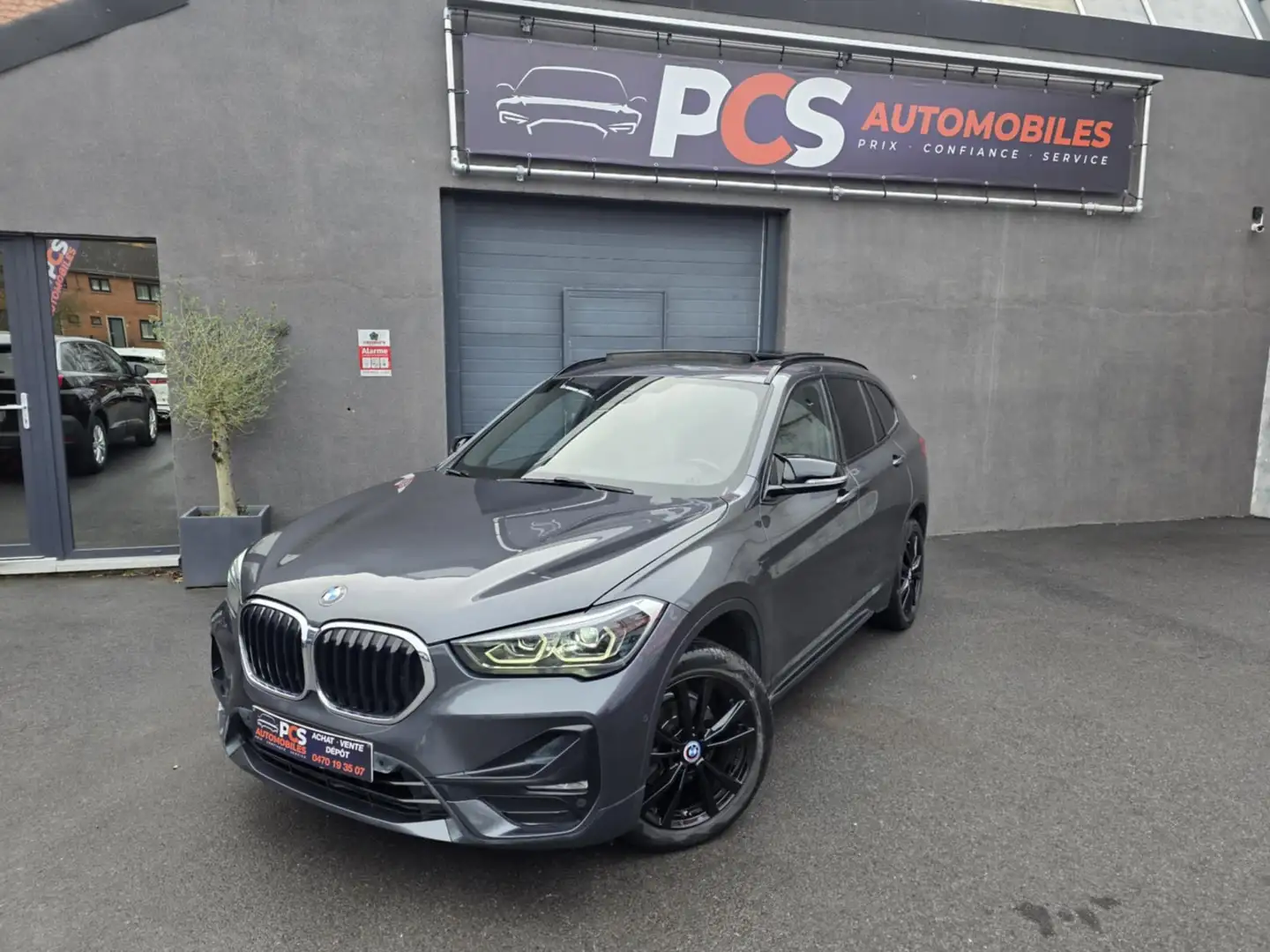 BMW X1 sDrive16 BOÎTE AUTO*CAMERA*TOIT OUVRANT*¨... Grigio - 1