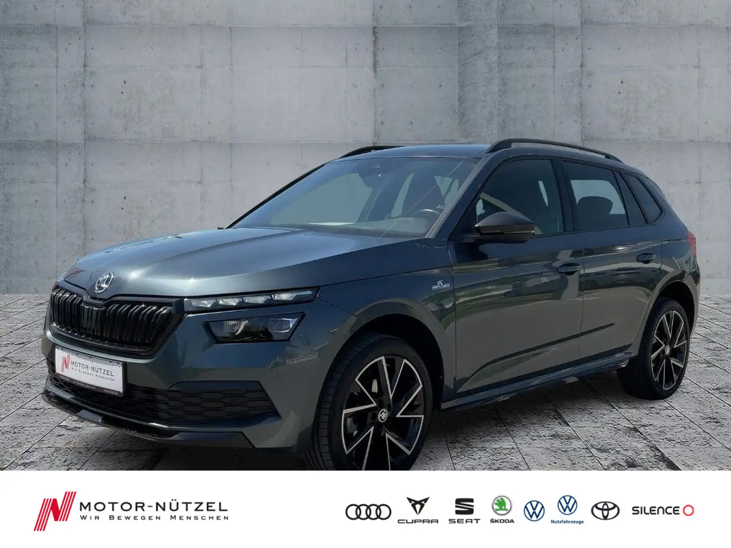 Skoda Kamiq 1.0 TSI MONTE CARLO LED+APP+GRA+SHZ+PANO Grau - 1