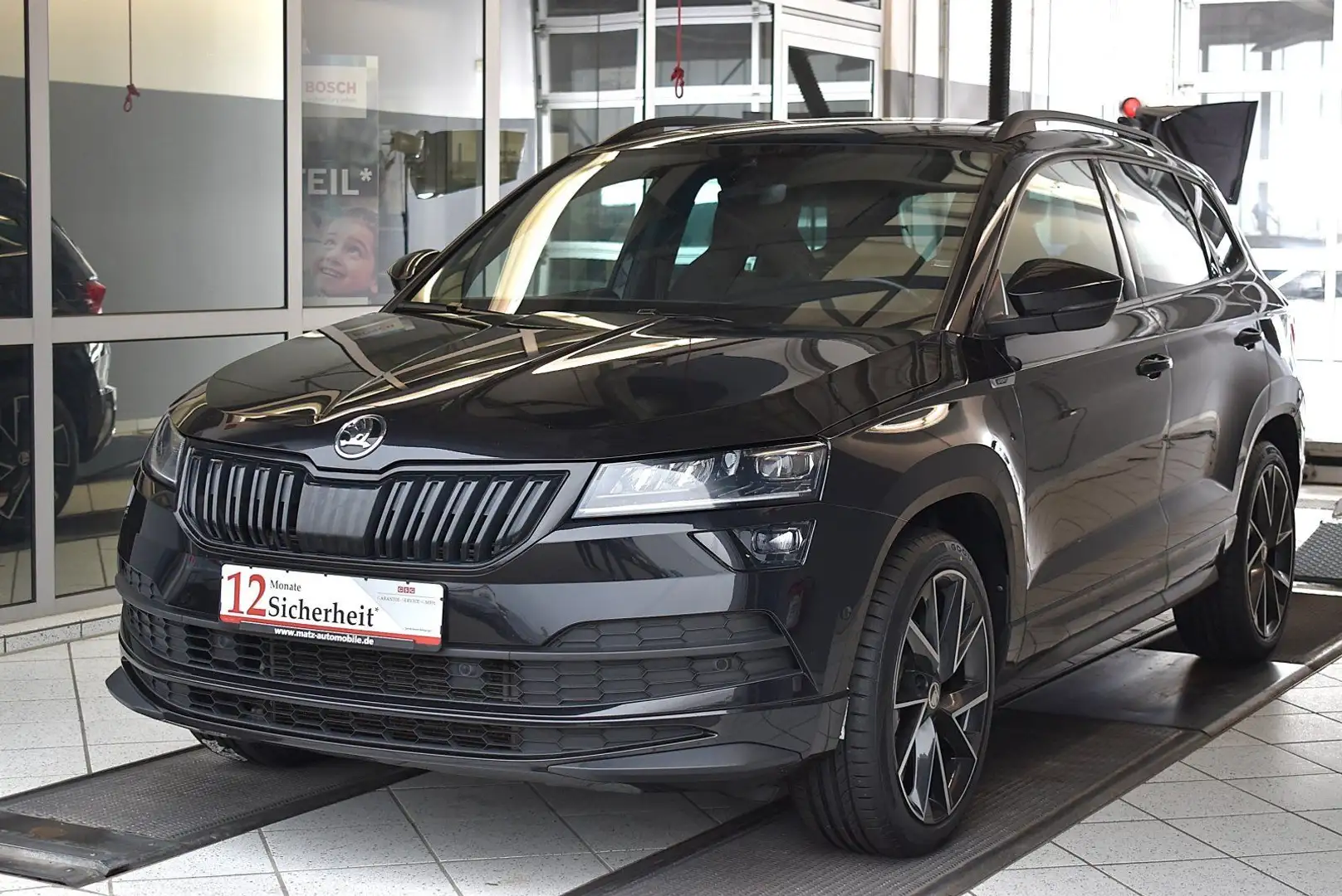 Skoda Karoq 2.0TSI Sportline 4x4 OPF DSG*ACC*PDC*SHZ*N Schwarz - 1