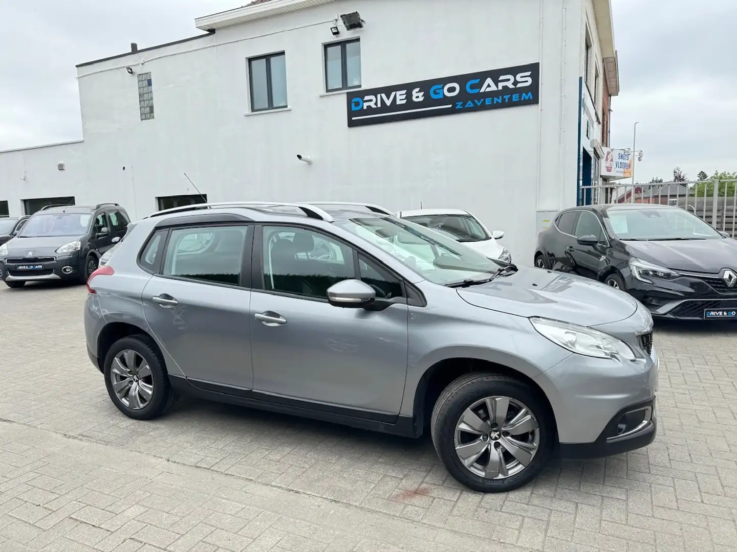 Peugeot 2008 1.2i Benzine - Automaat - Euro 6b Argent - 1