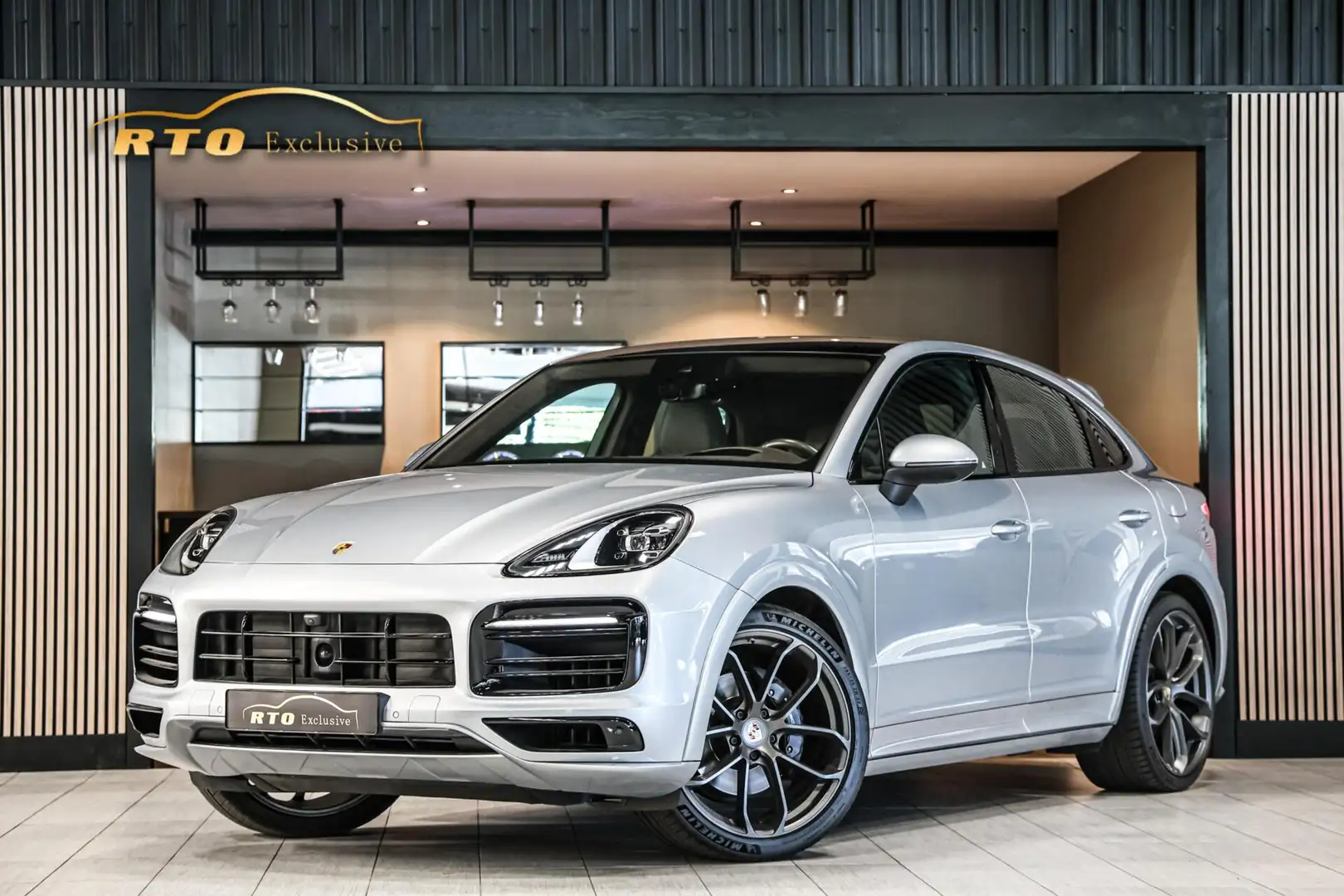 Porsche Cayenne Coupé 3.0 E-Hybrid|Sportdesign|luchtvering|22'' Grijs - 1