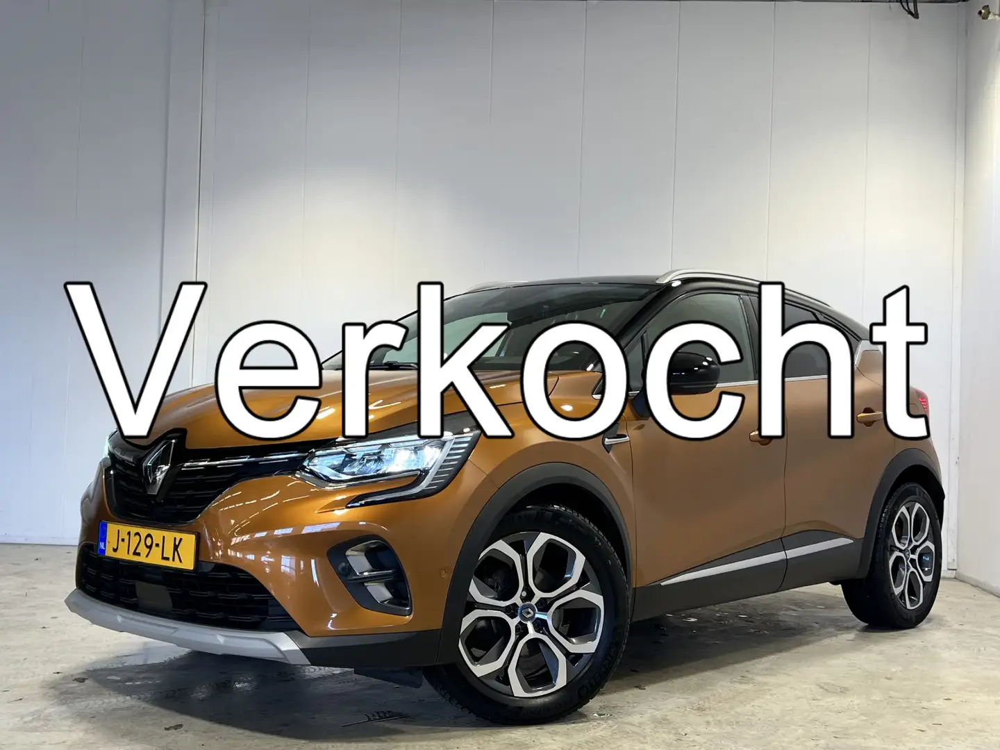 Renault Captur 1.6 E-Tech Plug-in Hybrid 160 Intens | Navigatie/A Orange - 1