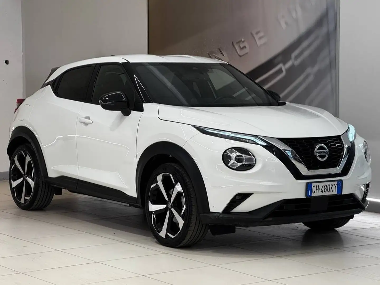 Nissan Juke 1.0 DIG-T 114 CV Tekna Wit - 1