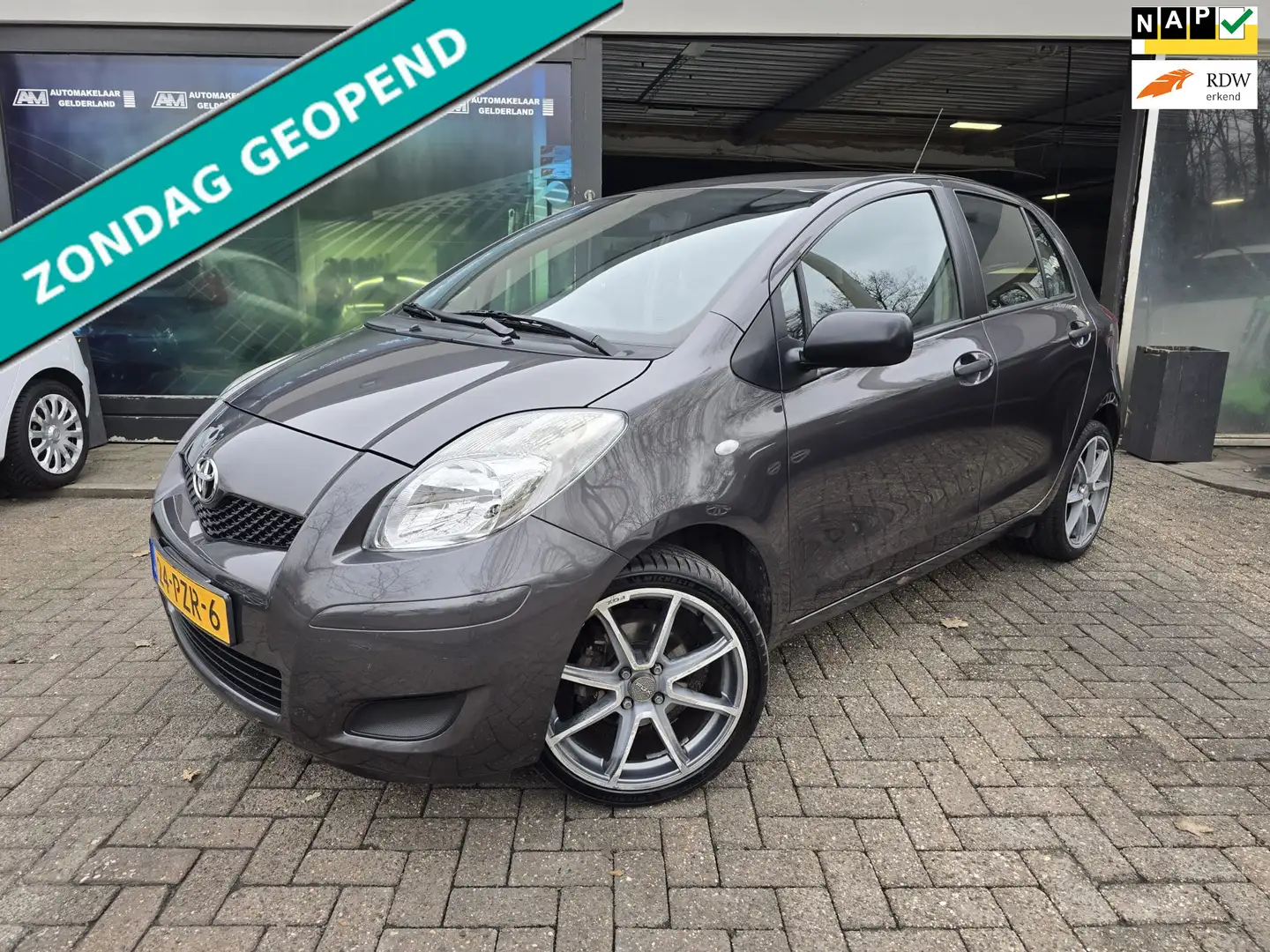 Toyota Yaris 1.0 VVTi Acces | 1E EIGENAAR | 12 MND GARANTIE | A Grau - 1