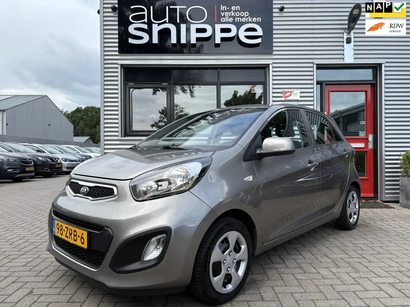 Kia Picanto 1.0 CVVT Comfort Pack -5DRS.-AIRCO-CV MET AB-ELEK. Grijs - 1