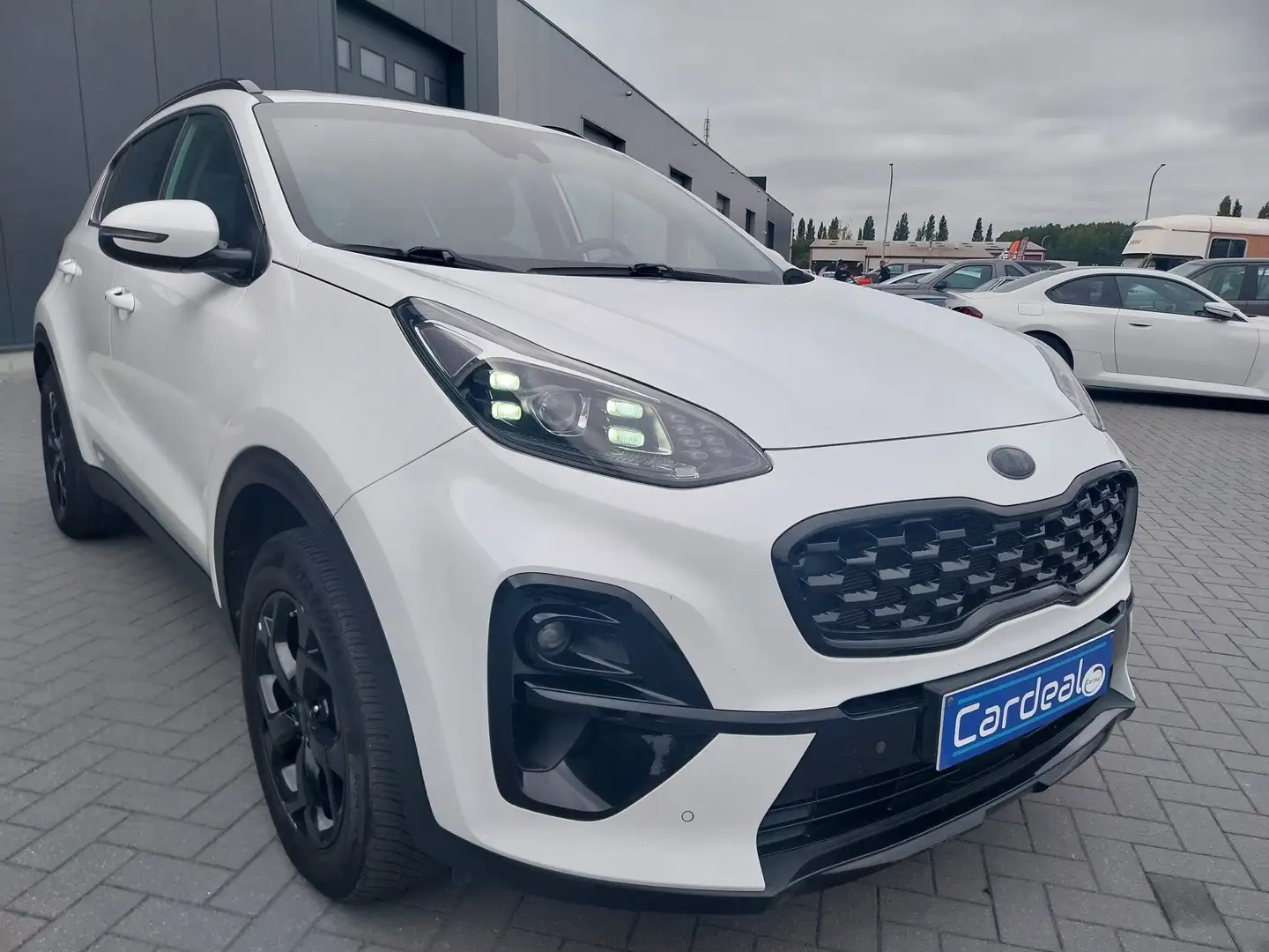 Kia Sportage 1.6i Black Edition/GPS/CARPLAY/CAMERA/GARANTIE/ Wit - 1