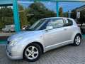 Suzuki Swift 1.3 Exclusive Airco, Keyless, 15Inch, APK, NAP Plateado - thumbnail 1