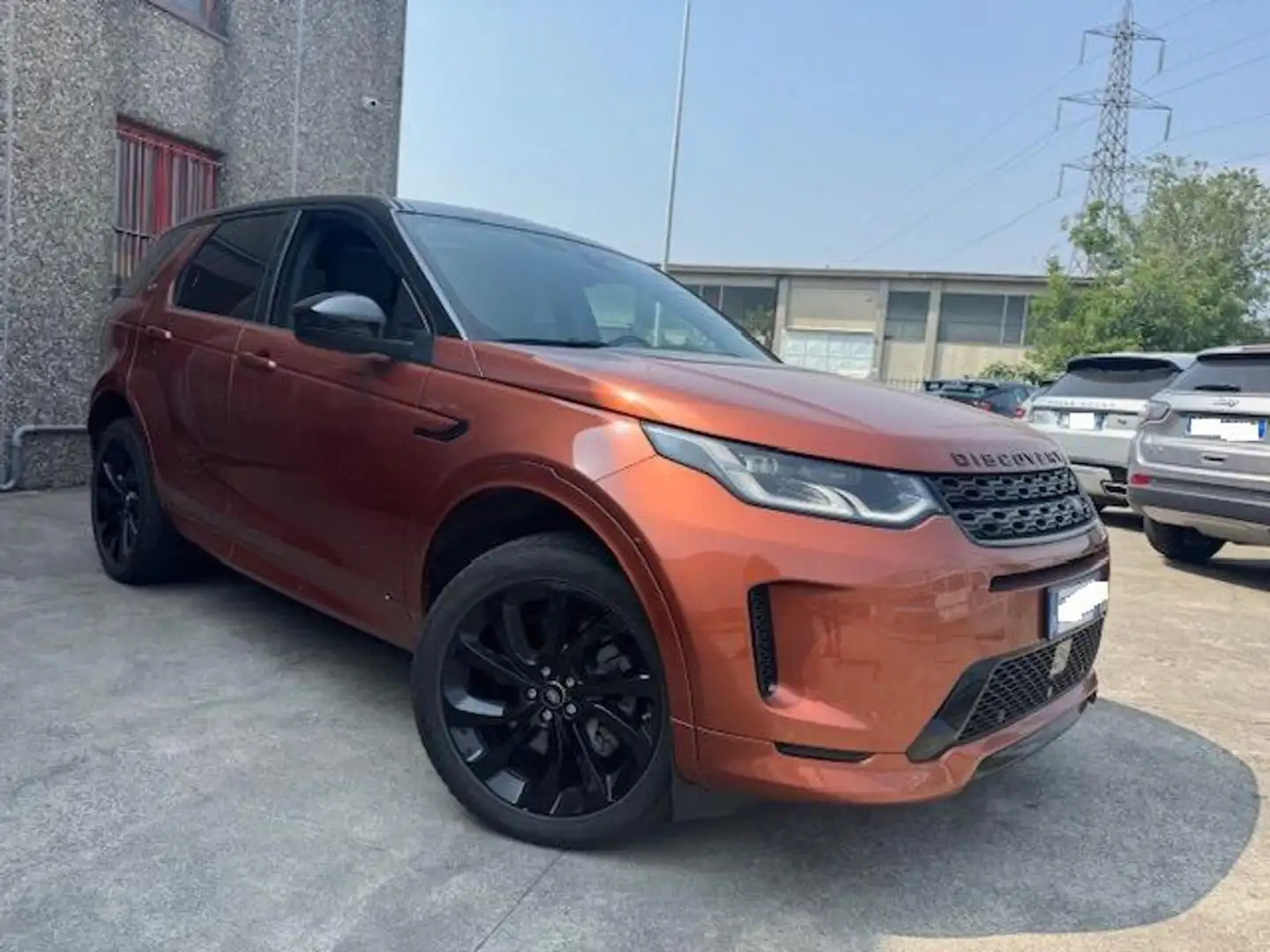 Land Rover Discovery Sport 2.0 TD4 180 CV AWD Auto R-Dynamic HSE TETTO PANORA Arancione - 1