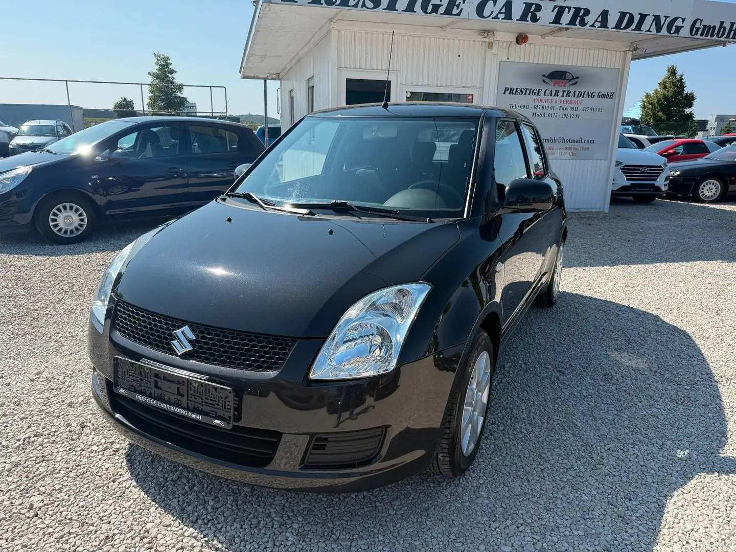 Suzuki Swift 1.3  Comfort*HAND*KLIMA* Schwarz - 1