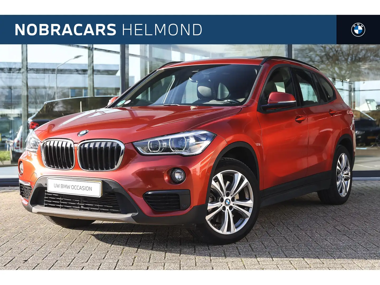 BMW X1 xDrive20i High Executive Automaat / Panoramadak / Orange - 1