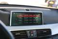 BMW X1 xDrive20i High Executive Automaat / Panoramadak / Orange - thumbnail 24
