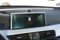 BMW X1 xDrive20i High Executive Automaat / Panoramadak / Orange - thumbnail 18