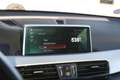BMW X1 xDrive20i High Executive Automaat / Panoramadak / Orange - thumbnail 20