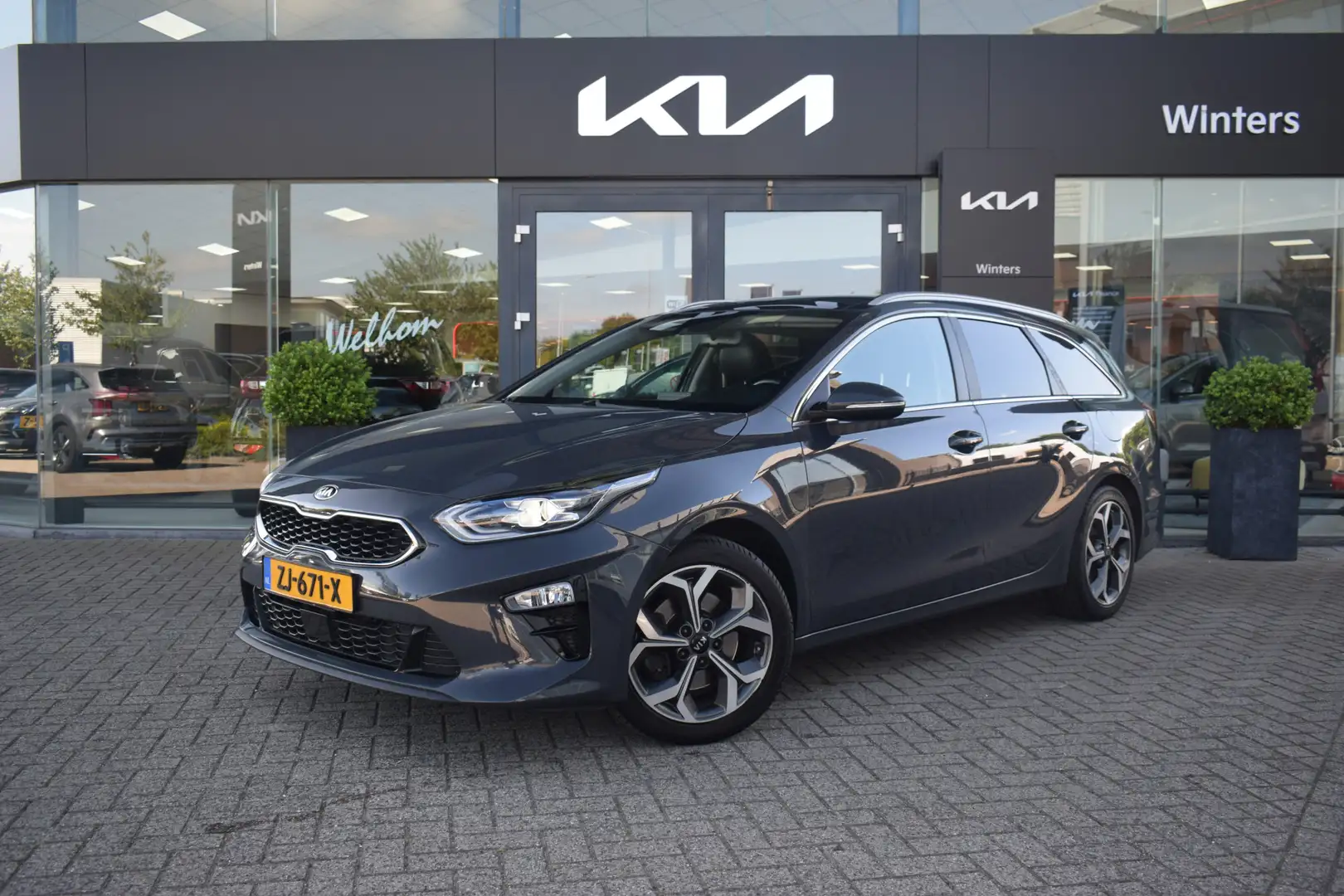 Kia Ceed SW / cee'd SW Sportswagon 1.4 T-GDi ExecutiveLine | Navigatie | Grijs - 1