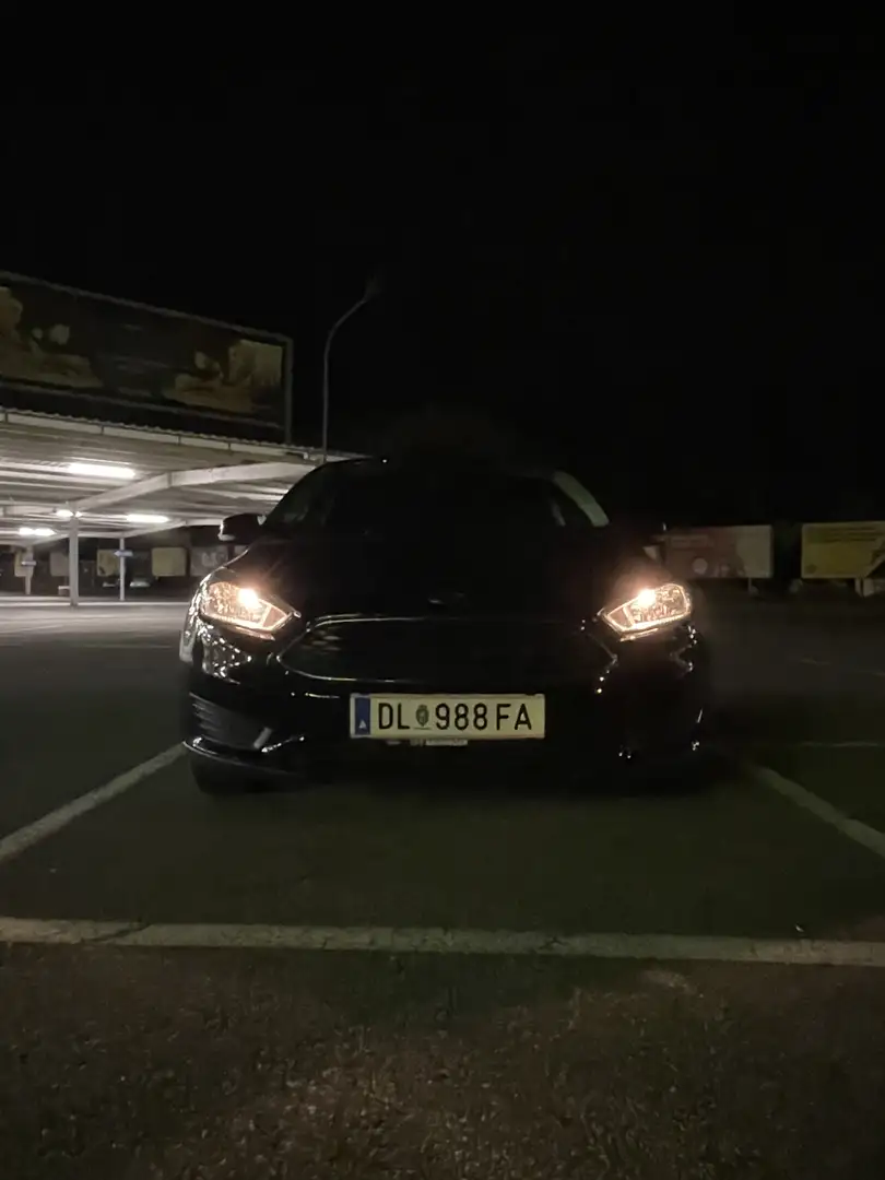 Ford Focus 1.6 Ti-VCT Ambiente Schwarz - 1