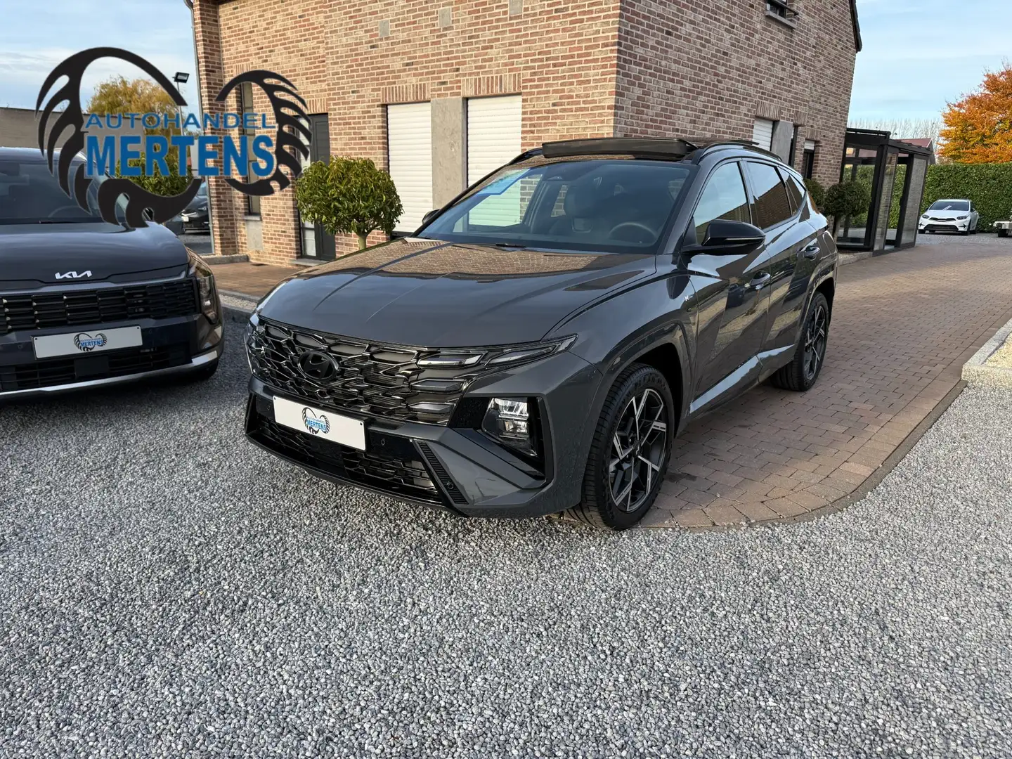 Hyundai TUCSON 1.6 T-GDi 150PK N-Line DCT PANO *NIEUW MODEL* 0KM Grijs - 1