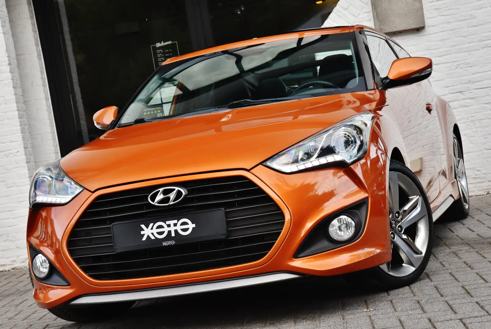 Hyundai VELOSTER 1.6 TURBO PREMIUM *** NAVI / PANO / CAMERA *** Oranje - 1
