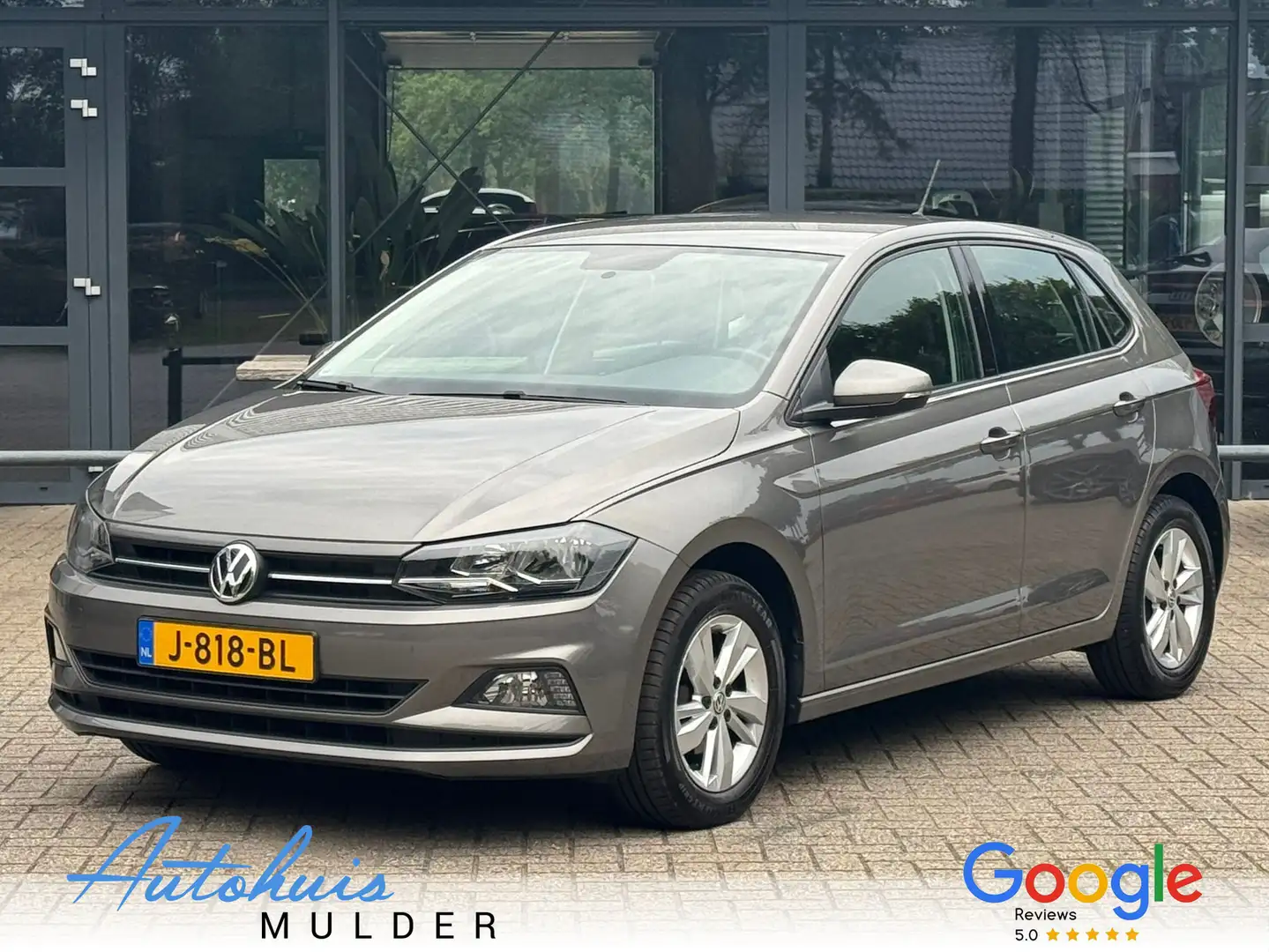 Volkswagen Polo 1.0 TSI Comfortline Airco/Cruise/Navi/LM-Velgen Grijs - 1