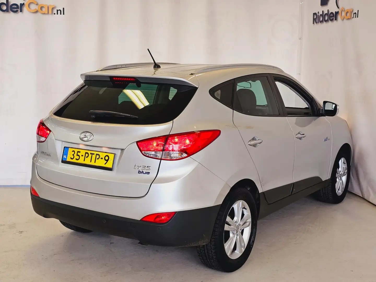 Hyundai iX35 1.6i GDI Style|NAP|CRUISE|PARK SENS|VELGEN|AIRCO|L Grijs - 2