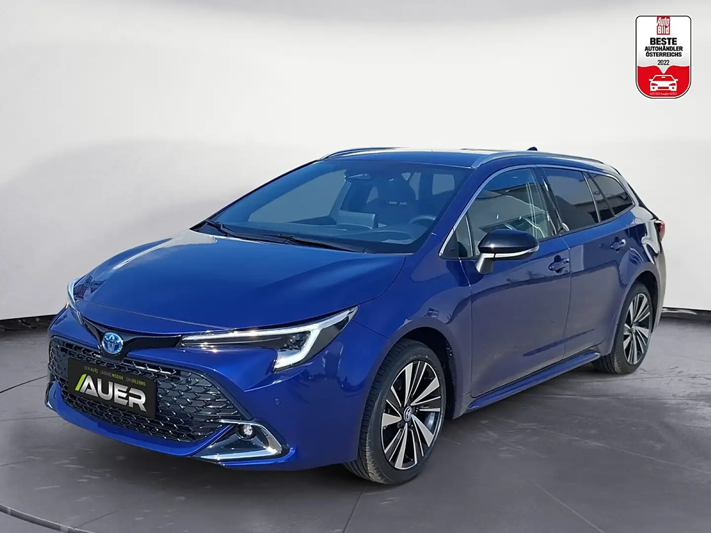 Toyota Corolla 1,8 Hybrid 140PS Touring Sports Teamplayer Blau - 1