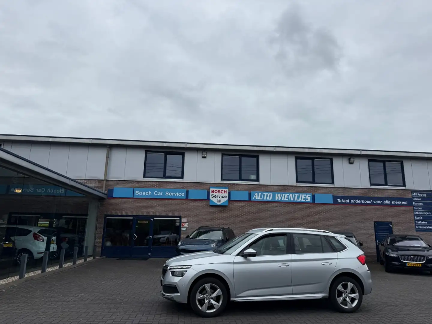 Skoda Kamiq 1.6 TDI 85kw | Business | Airco-Ecc | Navi | Carpl Grijs - 1