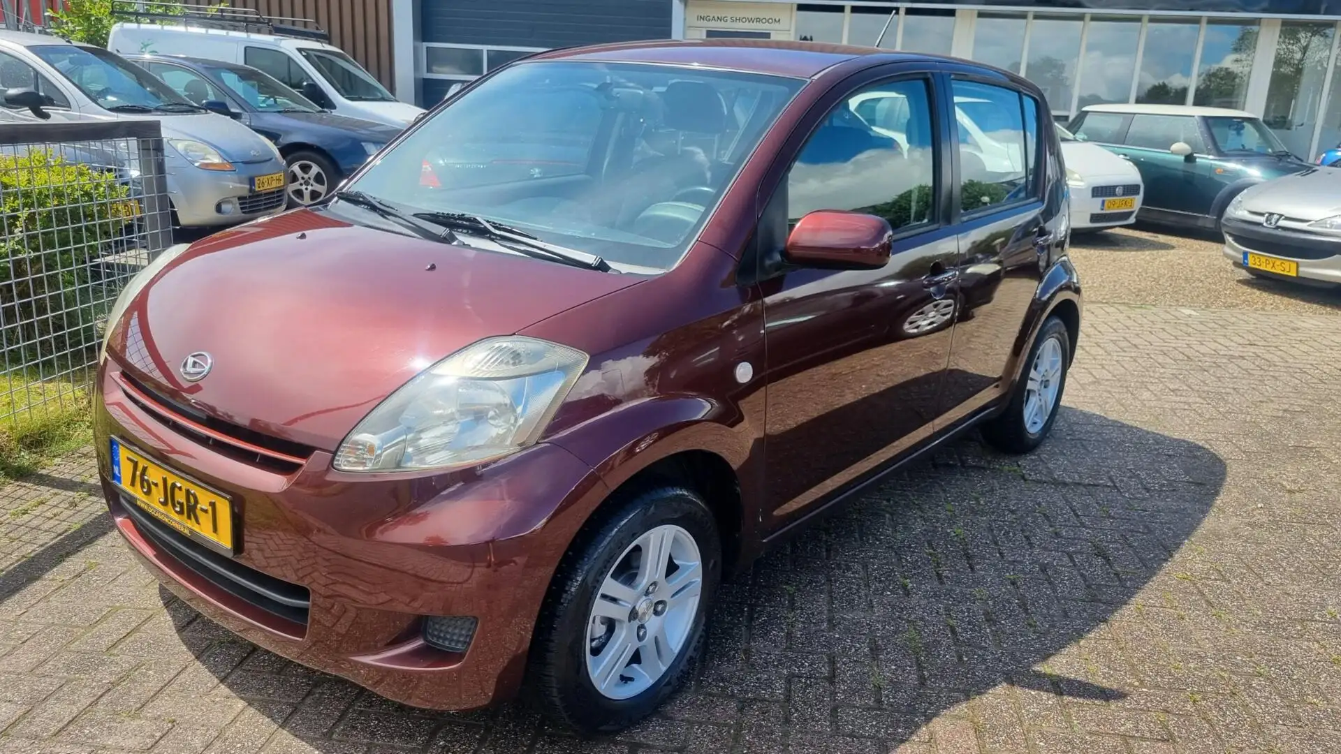 Daihatsu Sirion 2 1.0-12V Premium💢€1999,-💢127386 km vol jaar apk Rood - 1
