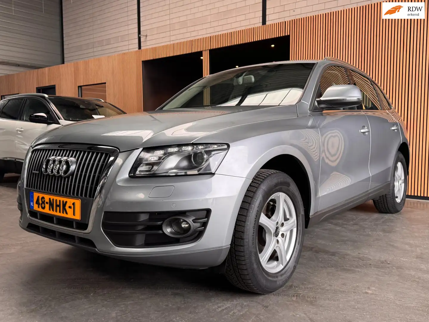 Audi Q5 2.0 TFSI quattro Pro Line Airco|Navi|Trekhaak|NAP Grijs - 1