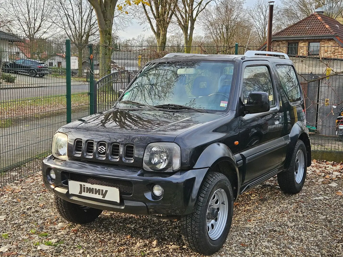 Suzuki Jimny 1.3 Life Style 4WD, 1.Da.-Hand TüV 11/2027 Schwarz - 1