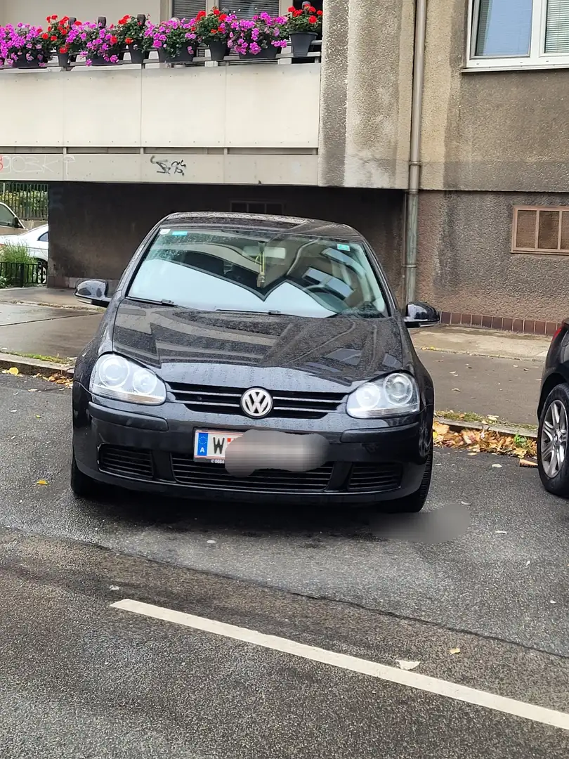 Volkswagen Golf Schraeghecklimousine Schwarz - 1
