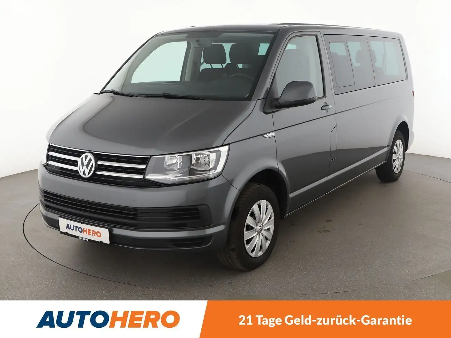 Volkswagen T6 Caravelle 2.0 TDI Comfortline lang Aut.*TEMPO*SHZ*AHK*PDC* Grau - 1