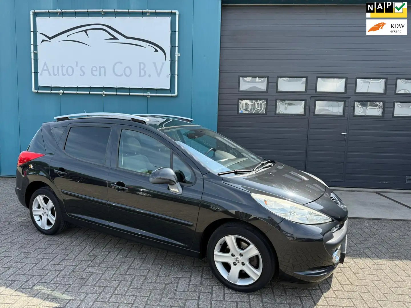 Peugeot 207 SW 1.4 VTi XS Clima Panoramadak 16" Lm velgen Pdc Noir - 1
