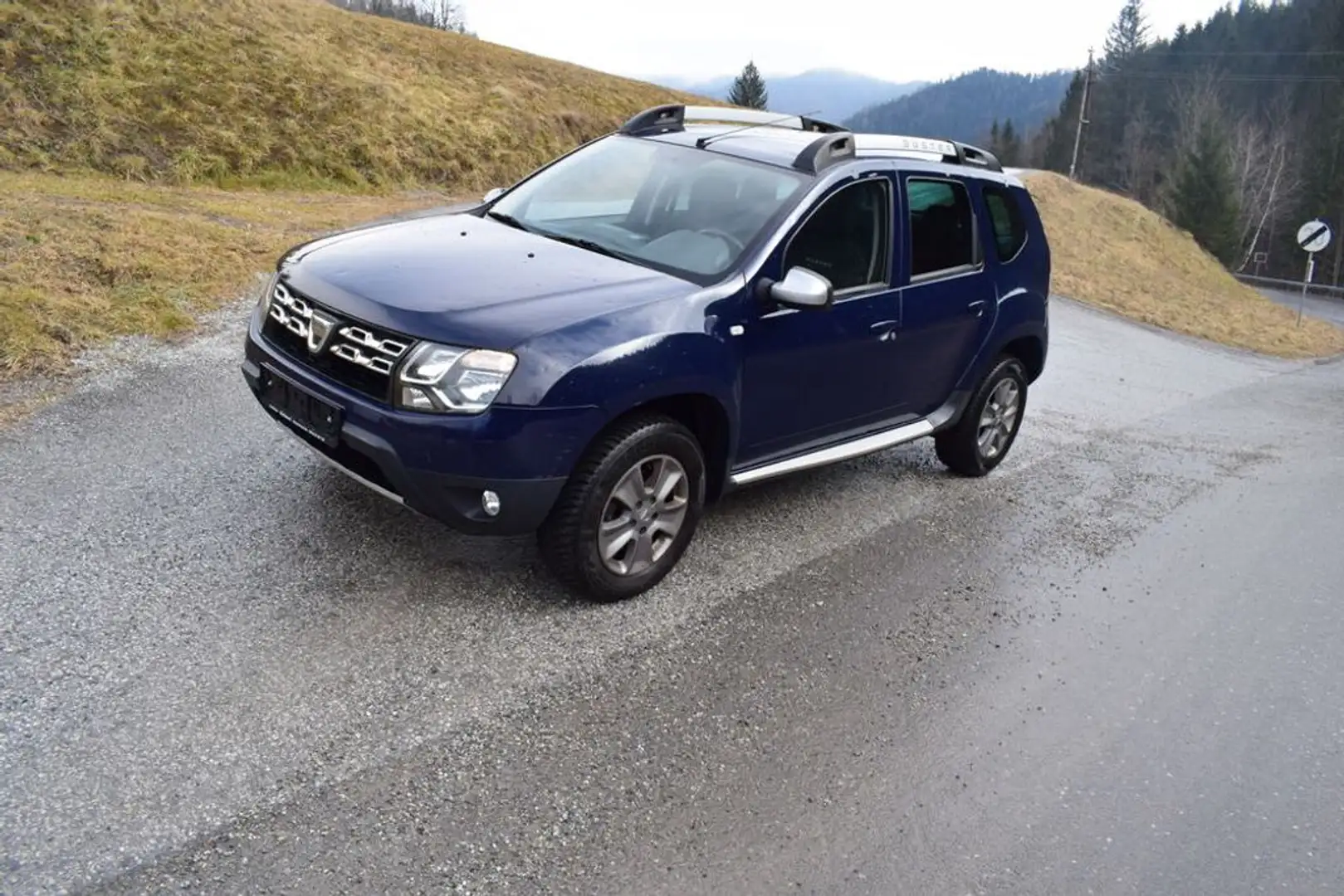 Dacia Duster Fiskal Supreme dCi 110 allrad garantie Blauw - 1