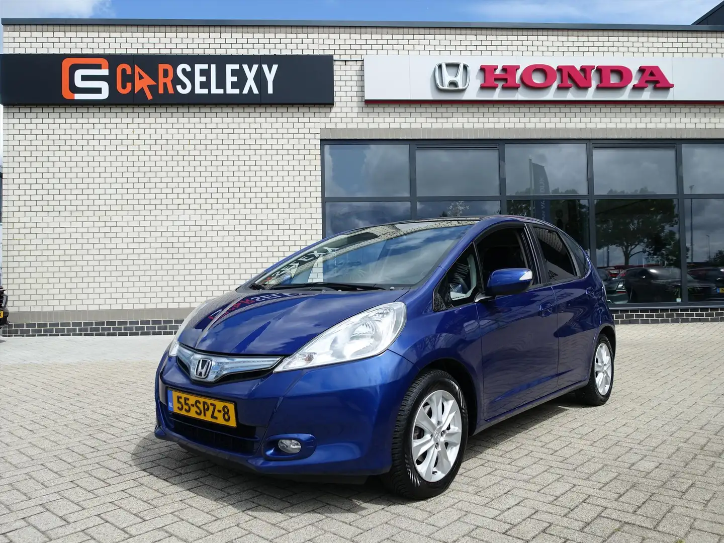 Honda Jazz Hybrid 1.4 i-VTEC 102pk CVT Elegance Blauw - 1