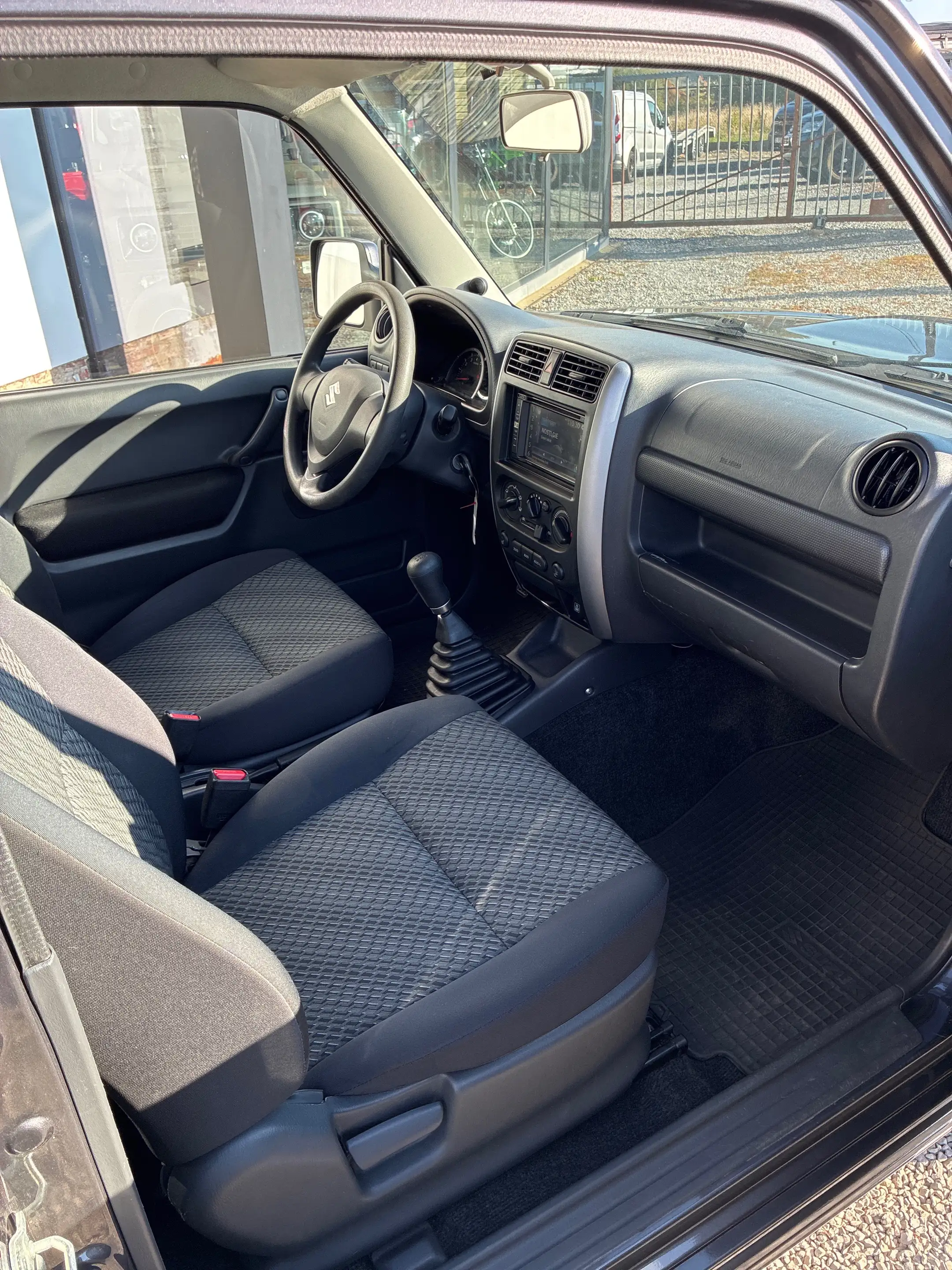 Suzuki Jimny Jimny 1.3i JX — photo 9