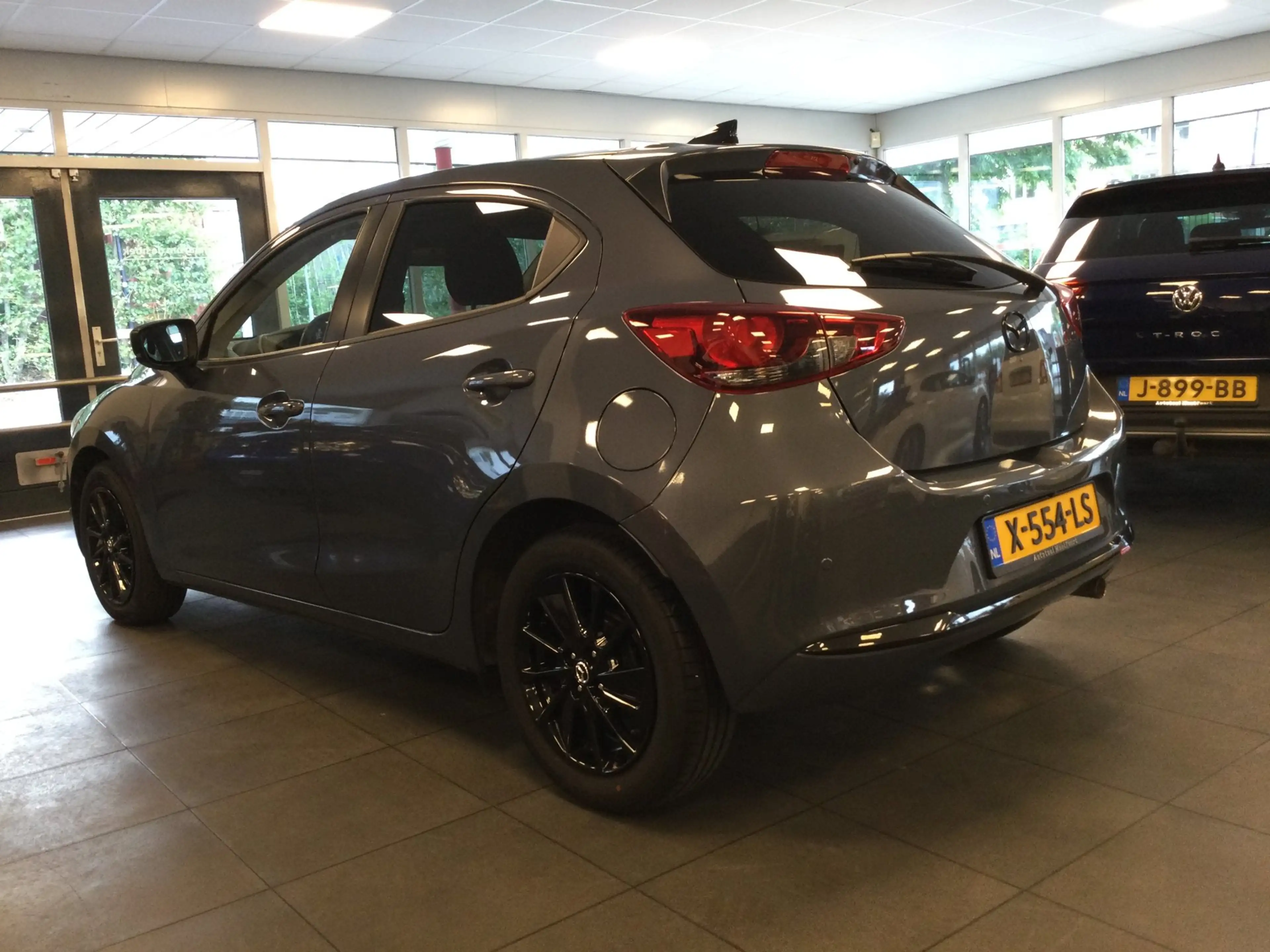 Mazda 2 1.5 e-SkyActiv-G 90 Homura Camera-PDC-Stuurverwarm — photo 4