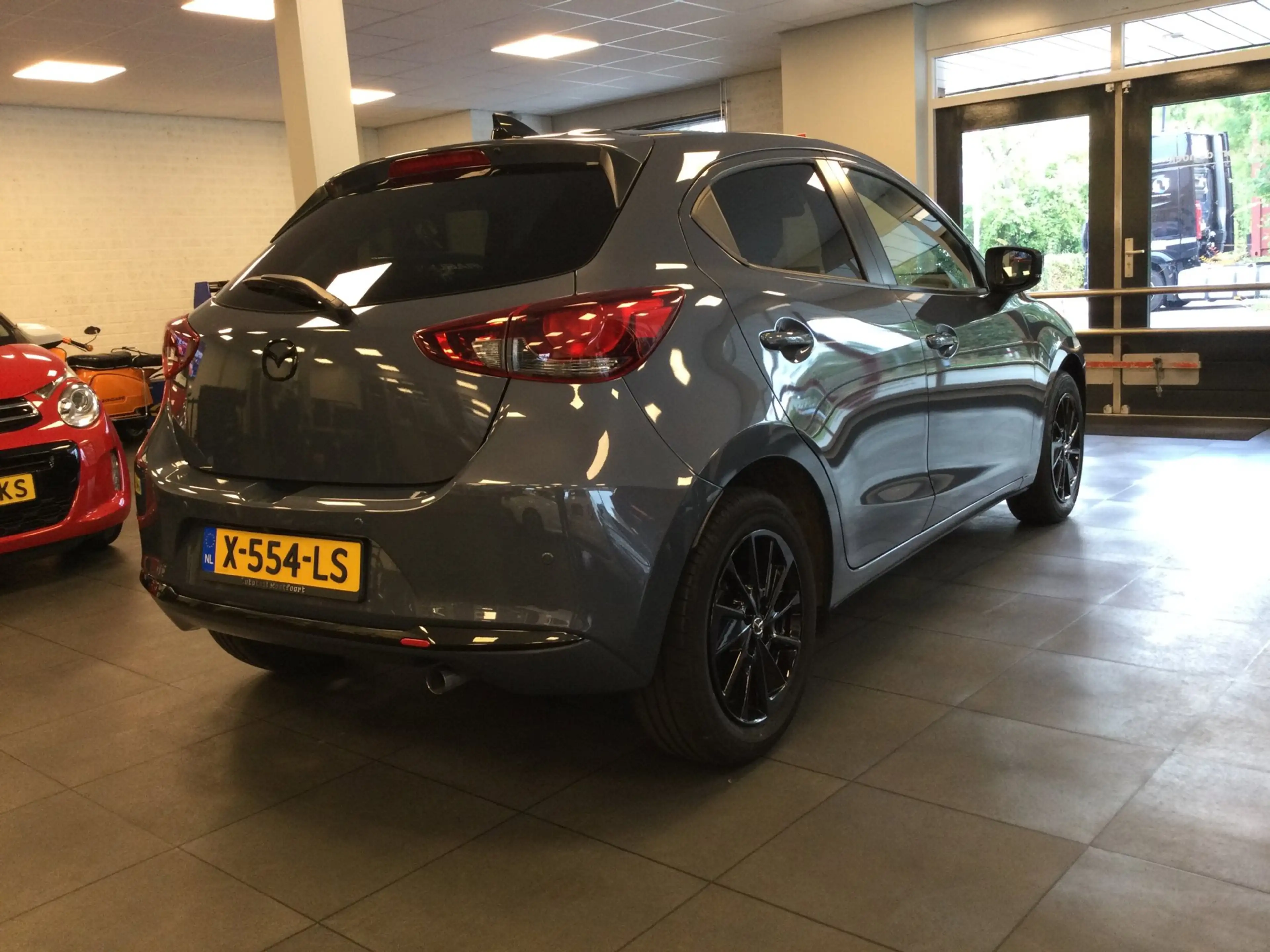 Mazda 2 1.5 e-SkyActiv-G 90 Homura Camera-PDC-Stuurverwarm — photo 3