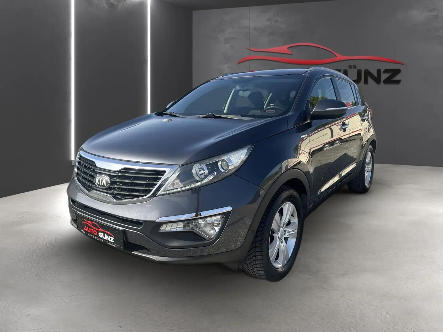 Kia Sportage 2.0 CRDI 4WD Aut. *Navi-R.Kamera* Gris - 1