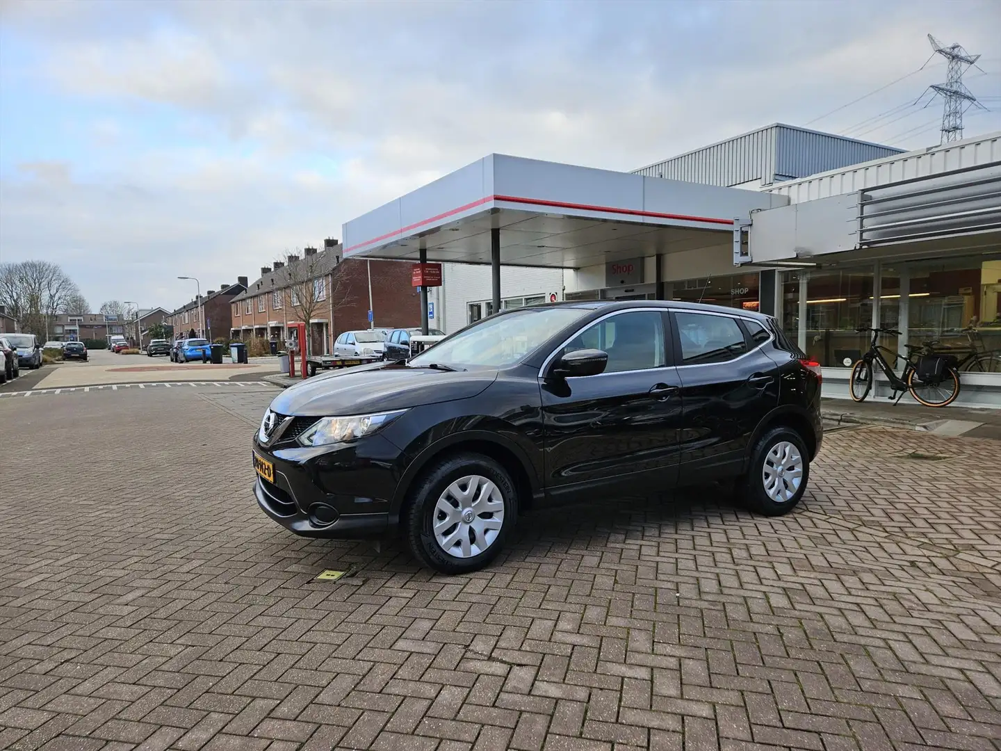 Nissan Qashqai 1.2 115pk DIG-T Visia Zwart - 1