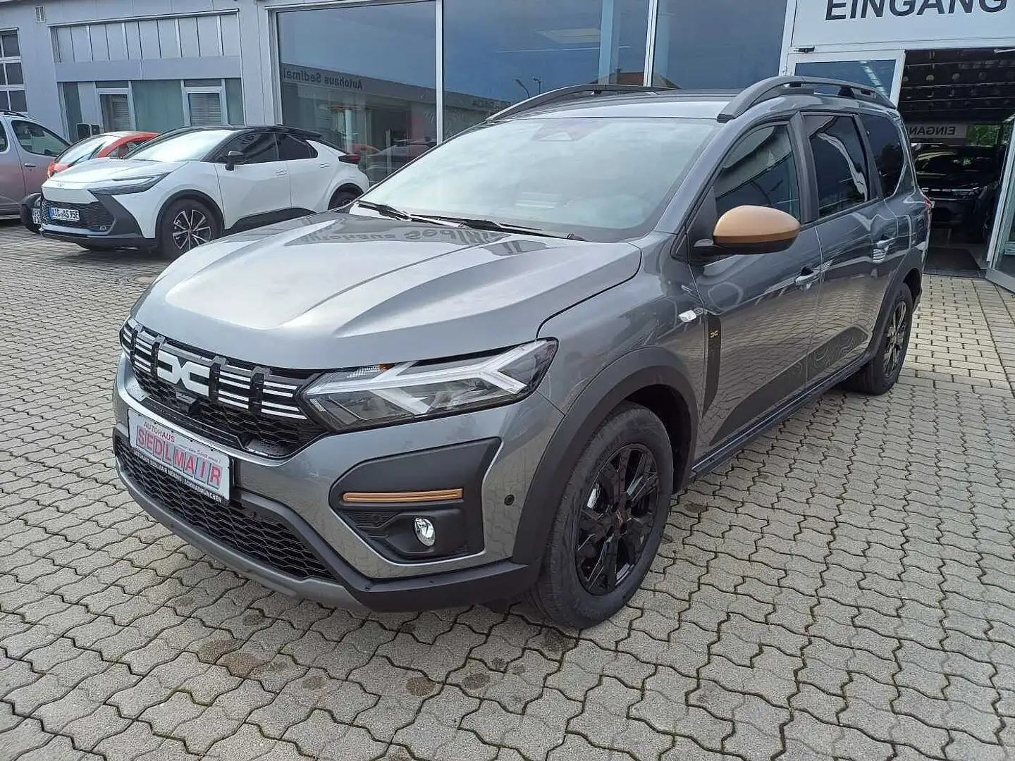 Dacia Jogger 1.6 HYBRID 140 Extreme+ 7-Sitzer/NAVI/SITZHEIZUNG/ Grau - 1