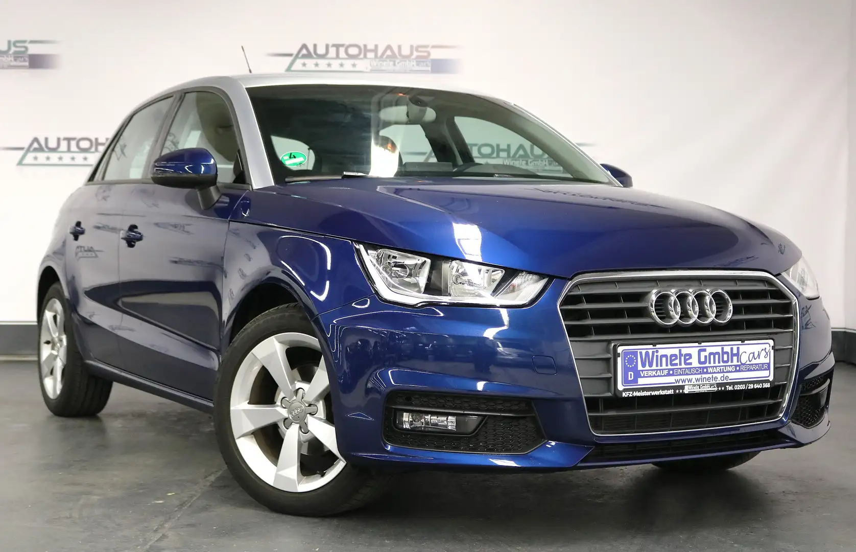 Audi A1 sport*1HAND*Rentnerfhz*NAVI*SHZ*PDC*8FachBereift* Blau - 1