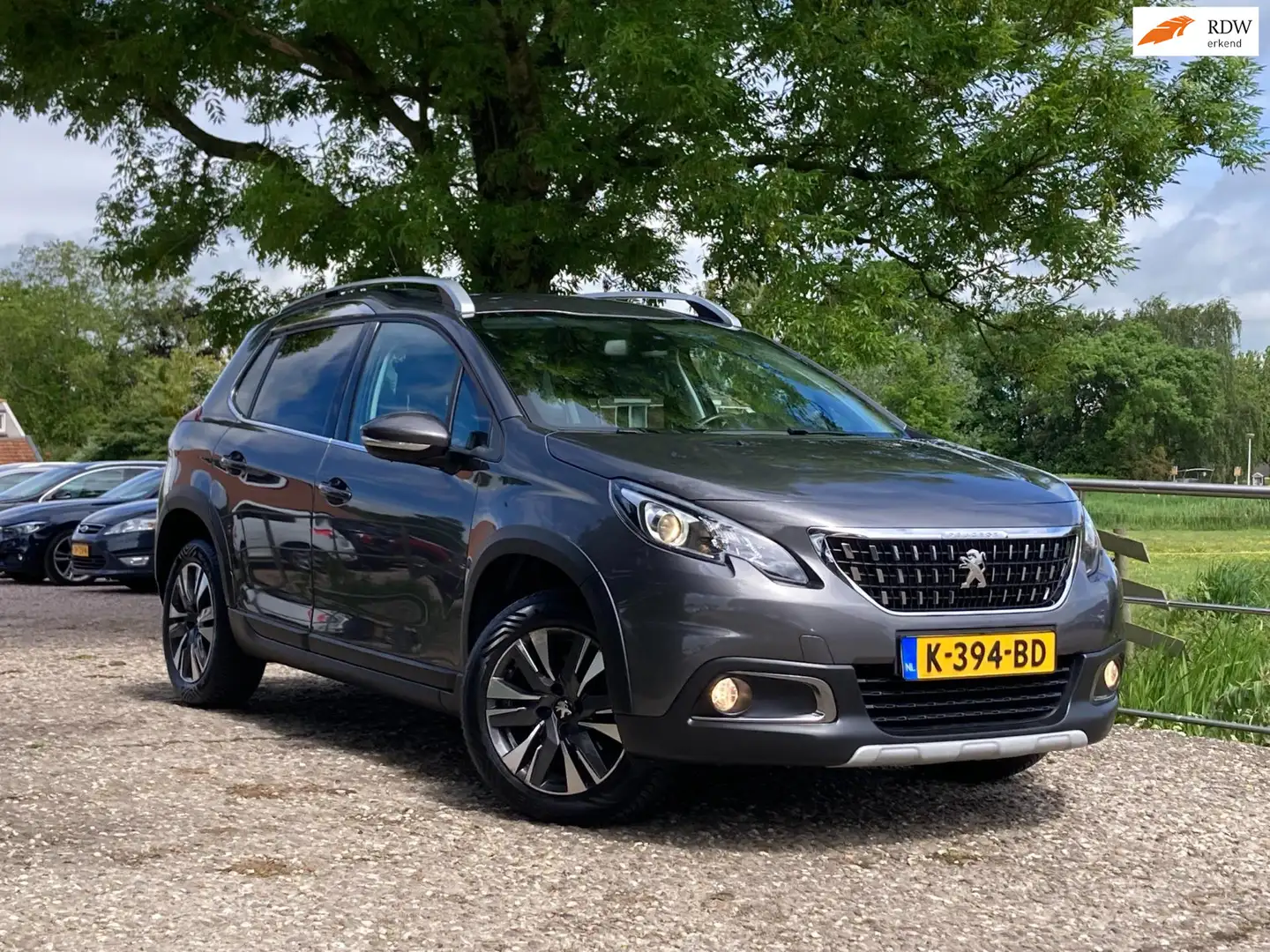 Peugeot 2008 1.2 PureTech Signature | Automaat + Leder + Clima Gris - 1