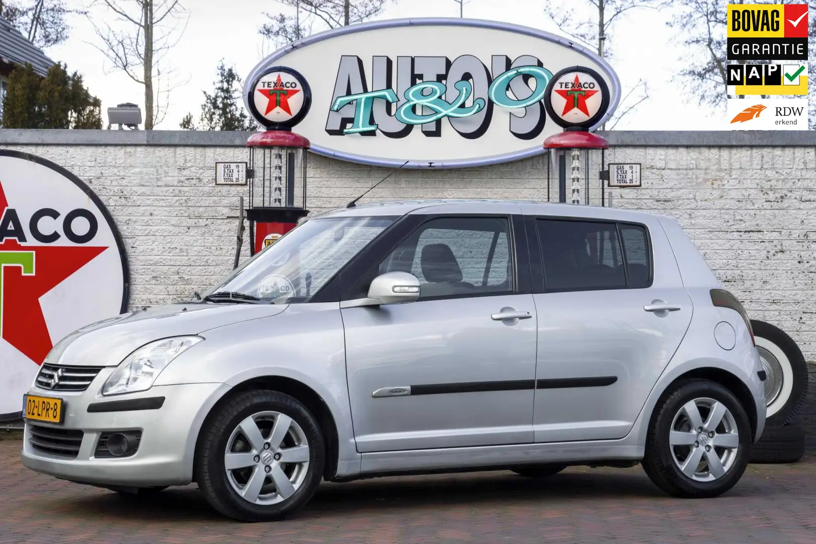 Suzuki Swift 1.3 Limited 49.600 km + NAP NL-auto Grigio - 1