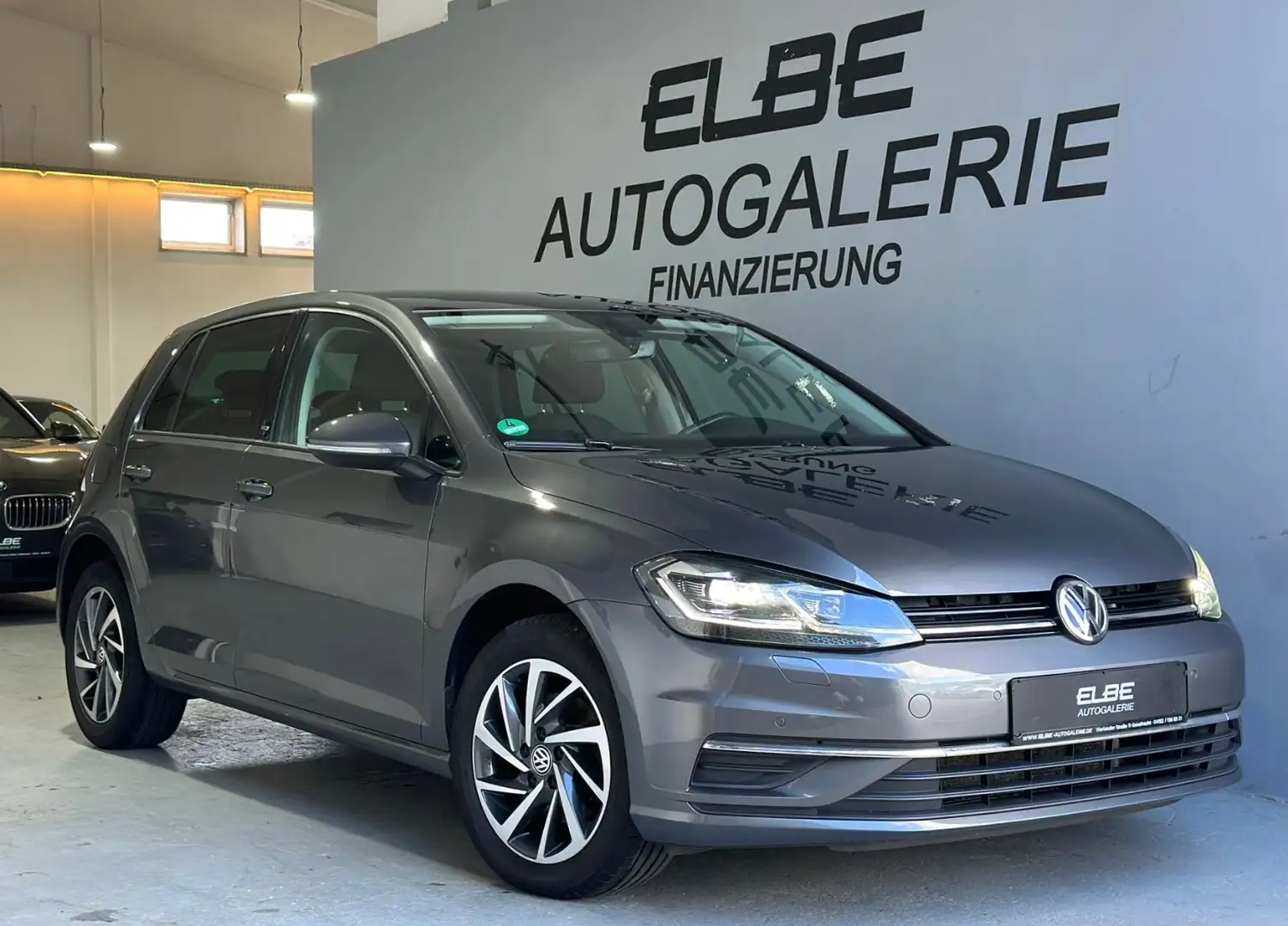 Volkswagen Golf VII Lim. 1.6 TDI DSG Sound 1Hand Scheckheft Grijs - 1
