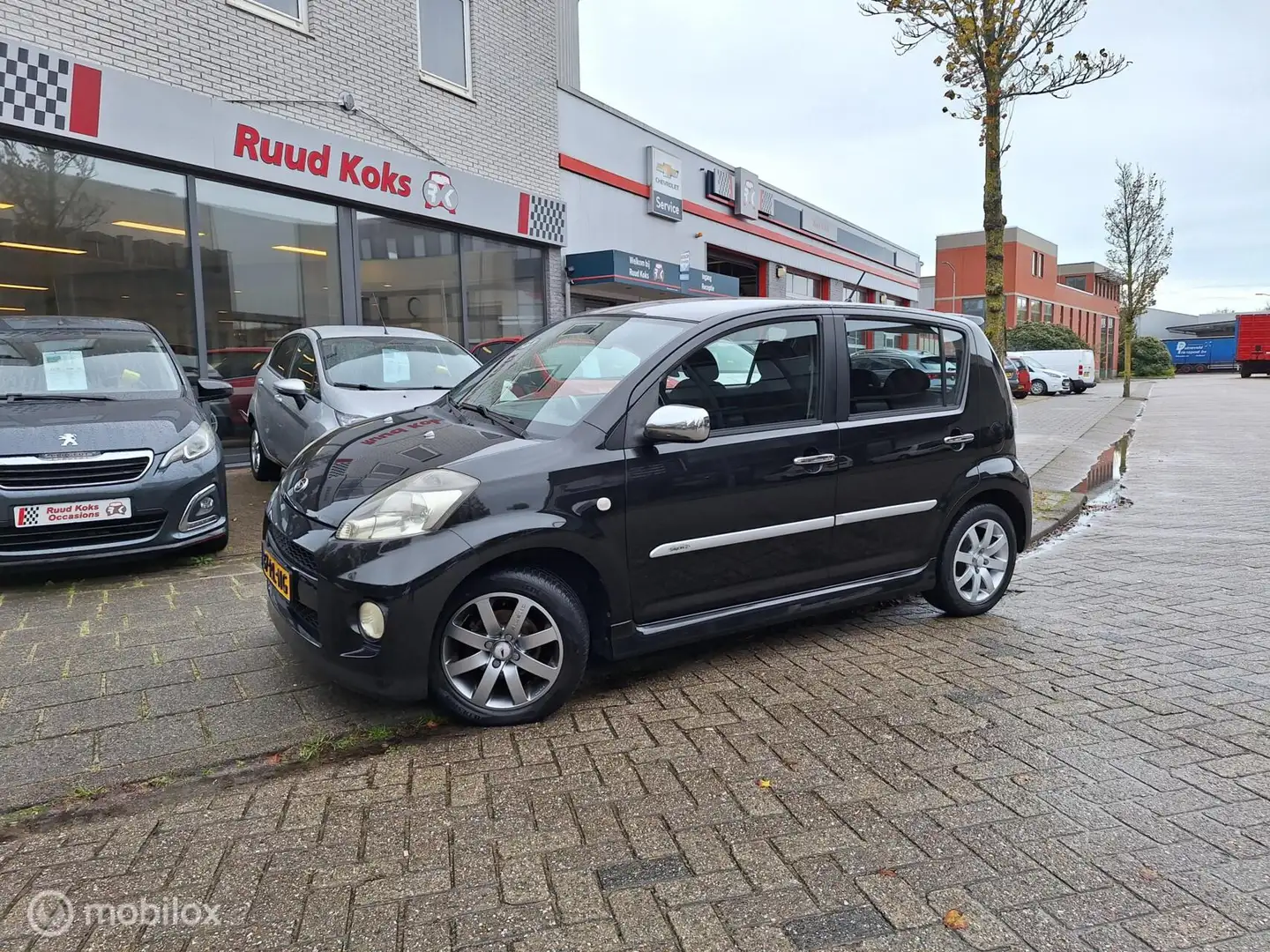 Daihatsu Sirion 2 1.3-16V COMFORT / Airco / Zwart - 1