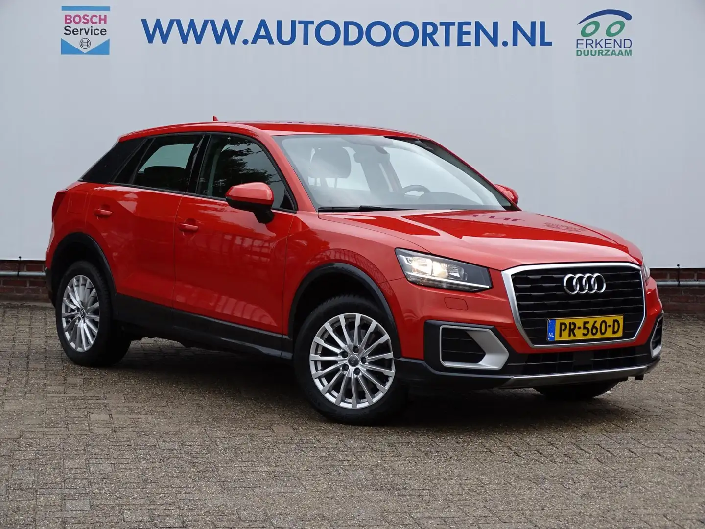 Audi Q2 1.4 TFSI CoD Design|TREKHAAK|NAV|CRUISE| Oranje - 1