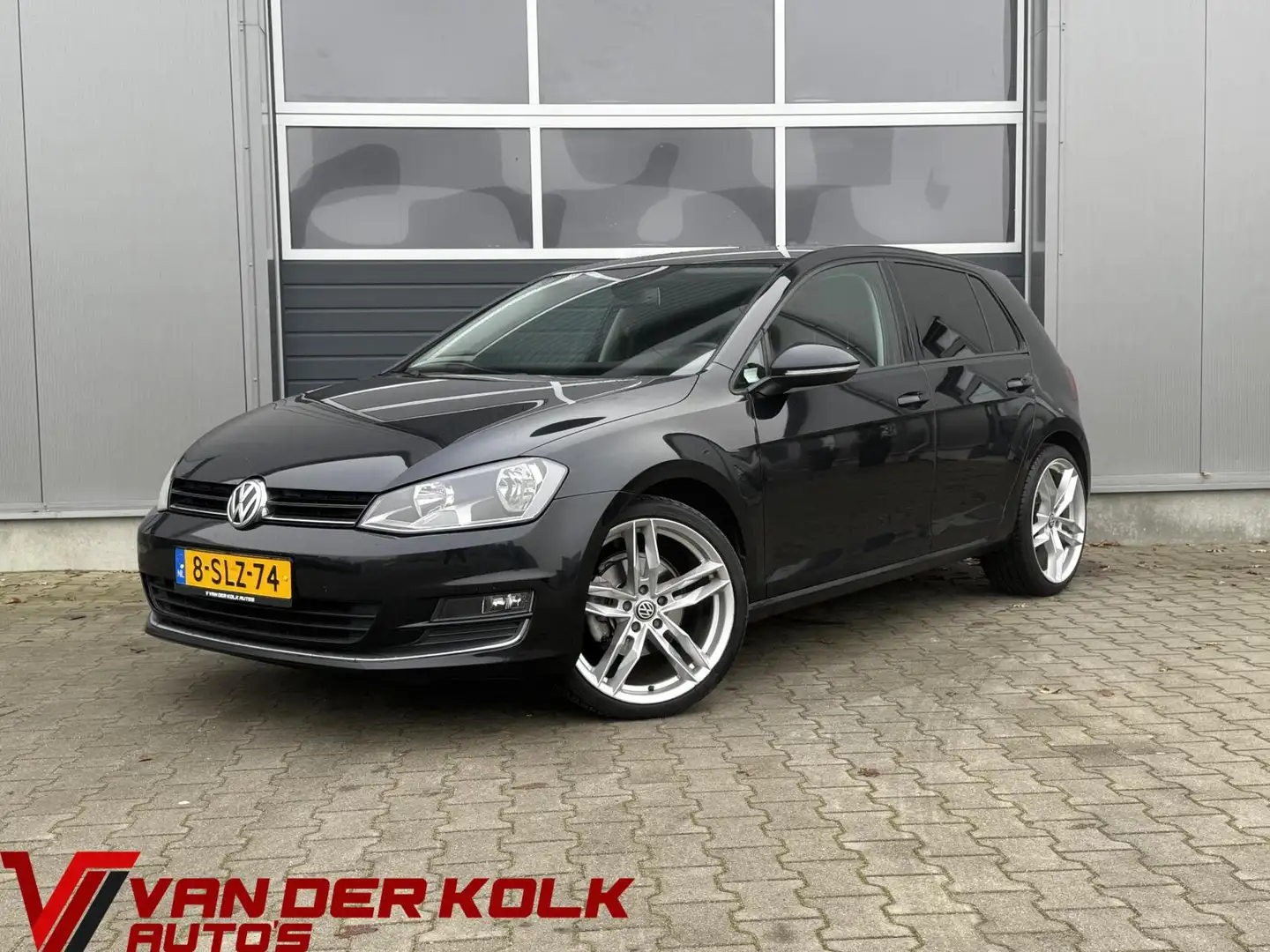 Volkswagen Golf 1.2 TSI Comfortline Navigatie Climate Cruise Licht Zwart - 1