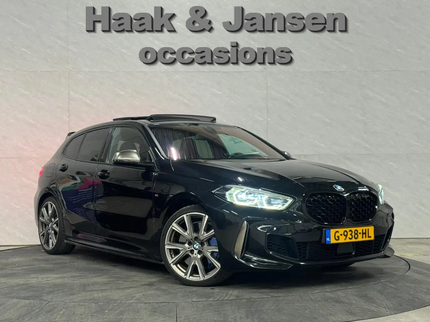 BMW 135 1-serie M135i xDrive High Executive Panoramadak Ke Zwart - 2