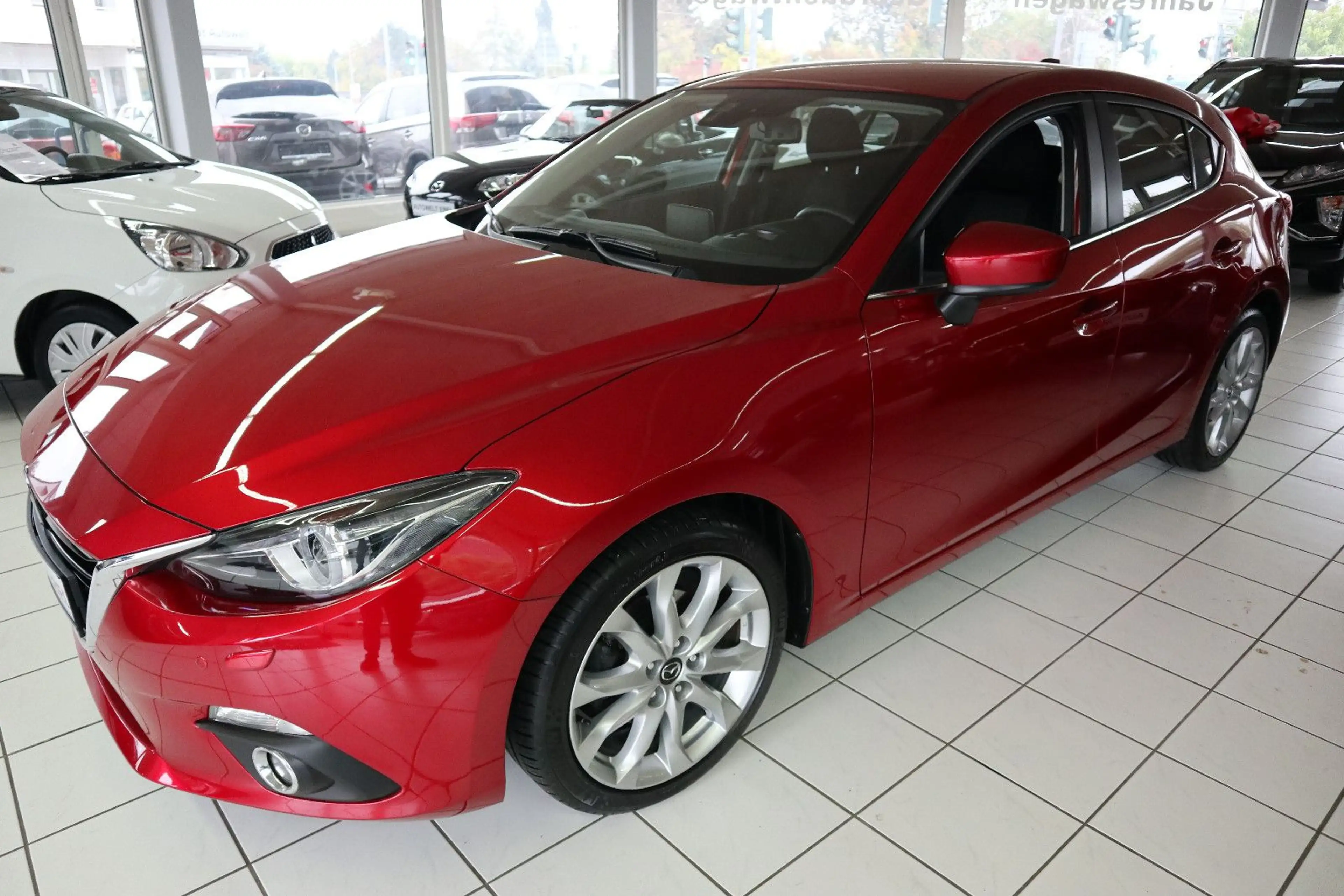 Mazda 3 Lim.*120PS*NAVI*BOSE*XENON*INSP. NEU*1. HAND*