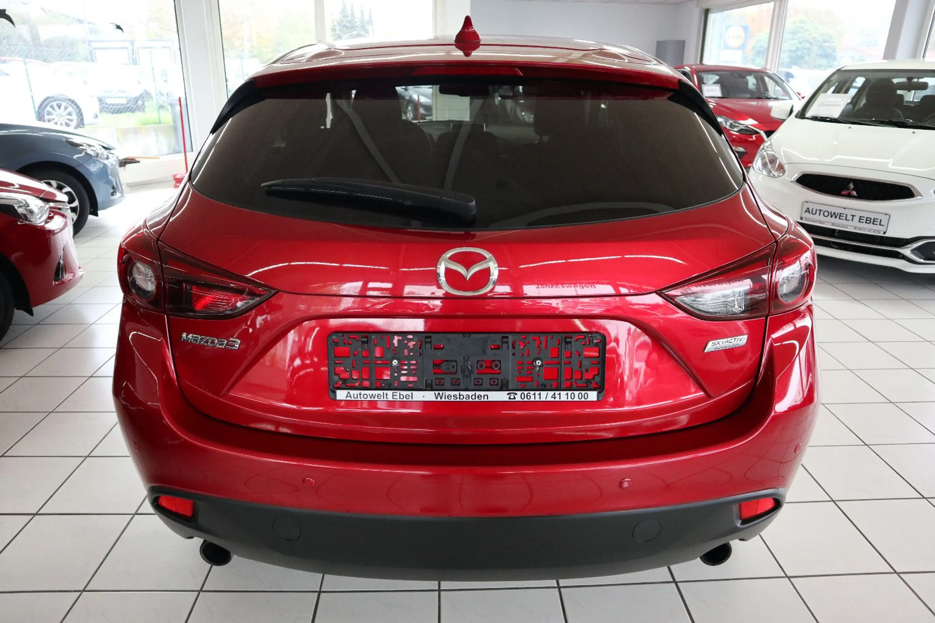 Mazda 3 Lim.*120PS*NAVI*BOSE*XENON*INSP. NEU*1. HAND* — photo 7