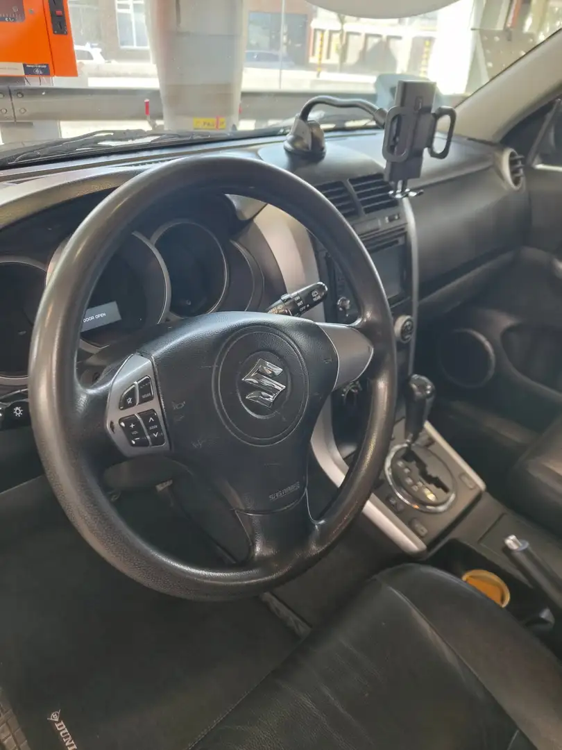 Suzuki Grand Vitara Grand Vitara 2.0-16V Exclusive Зелений - 1
